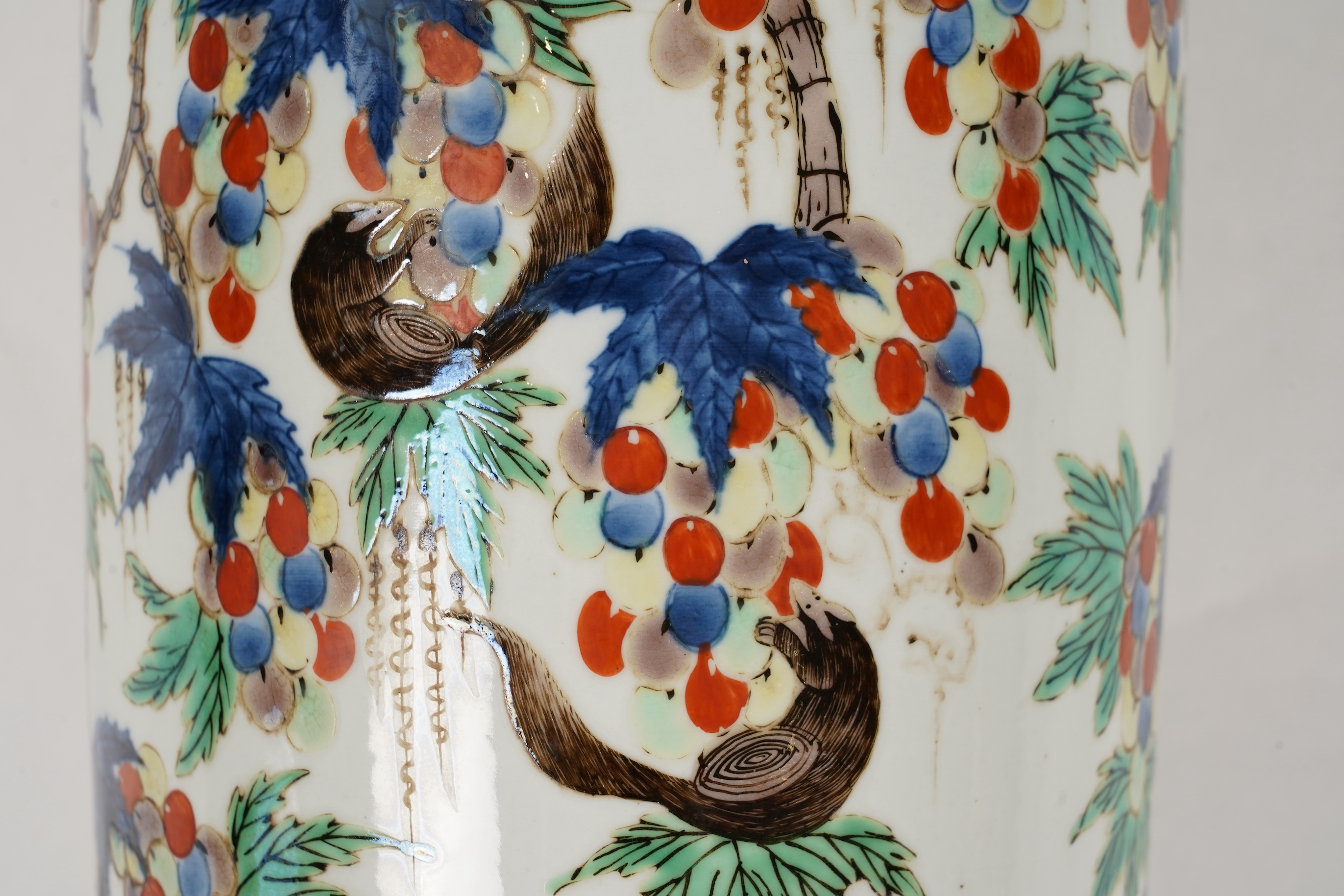 A Chinese wucai ‘squirrel and grapevine’ sleeve vase, Kangxi style
